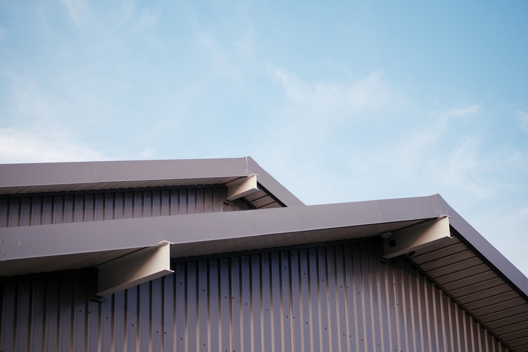 Two eaves of a building overlapping.